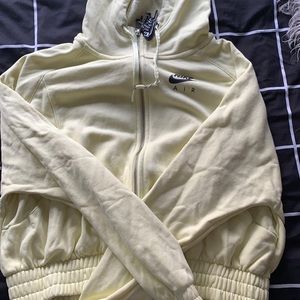 Yellow Nike cropped zip up